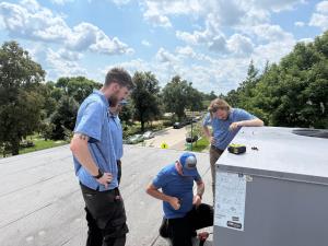 Technician inspecting a Boiler system in Aurora IL.