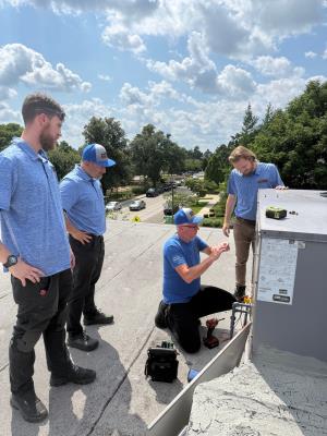 First Care Heating and Air LLC crew wrapping up HVAC work in Naperville IL.